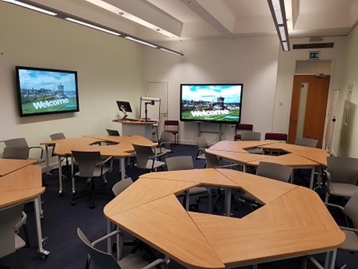 active learning clasroom with tables and chairs